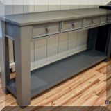 F19. Gray painted console table. 30"h 62"w x 21"d 